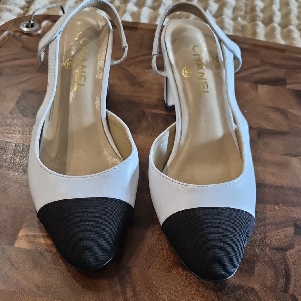 CHANEL White Leather Slingback Heels with Black Cap Toe